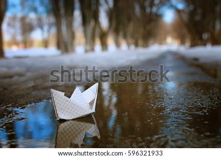 tinted photo paper boat on spring street