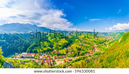 Rural landscape Bran, Moeciu village, Transylvania landmark, Romania Royalty-Free Stock Photo #596330081