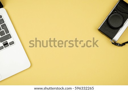 Minimal workplace with notebook and copy space on pastel background. Top view. Flat lay.