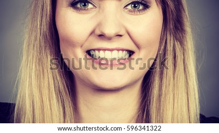 Happiness face expressions concept. Portrait of happy cheerful blonde woman smiling with joy