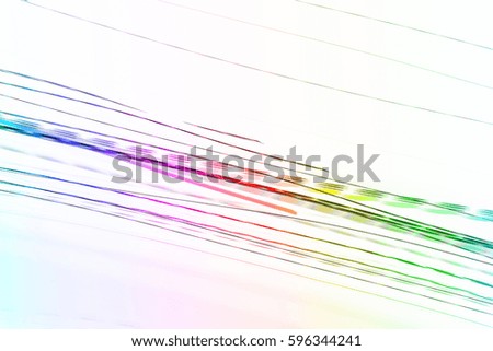 Abstract image of colorful lights blurred by motion on  white background