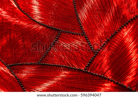 Abstract background with red threads.