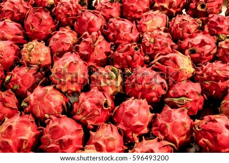 A lot of dragon fruits , exotic background.
