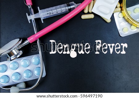 Dengue Fever word, medical term word with medical concepts in blackboard and medical equipment. 