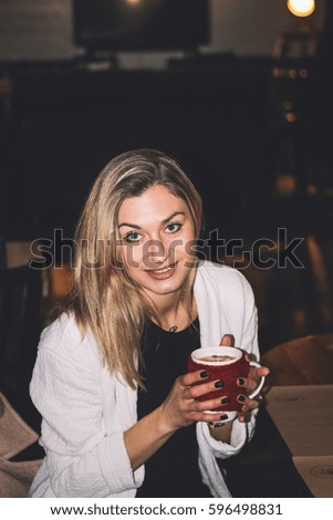 Beautiful Woman With Cup of Tea or Coffee
