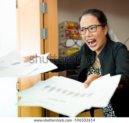shouting and yelling of businesswoman,Aggressive screaming woman,picture of angry businesswoman with documents,disappointed with job, do it new all, businesswoman pungent are paperwork,Emotional scene