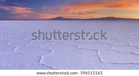The world's largest salt flat, Salar de Uyuni in Bolivia, photographed at sunrise.