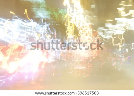 Abstract of blur picture of neon light lines on road at night by drunker. Dangerous situation. Background in drunkenness concept.
