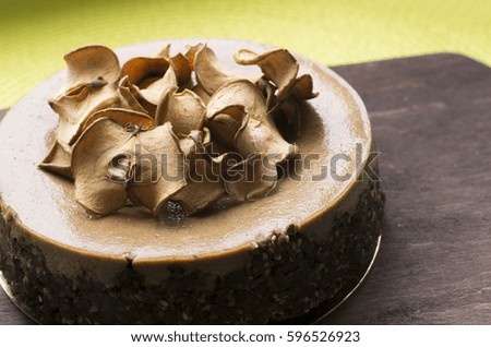 Still life  of cheesecake  decorated with Dried apples