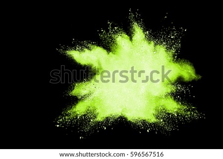 abstract powder splatted background. Colorful powder explosion on black background. Colored cloud. Colorful dust explode. Paint Holi.
