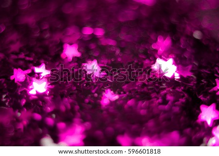 Luxury holiday blur abstract background with disco light. Festive pink sparkling wallpaper