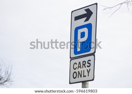 Parking sign with Cars only text underneath Irish Road Signs