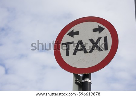 Taxi sign red black and white Irish Road Signs