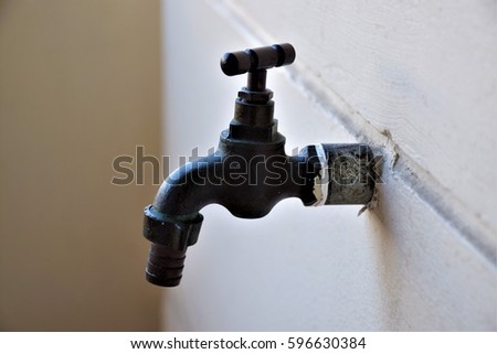 Faucet Water Royalty-Free Stock Photo #596630384