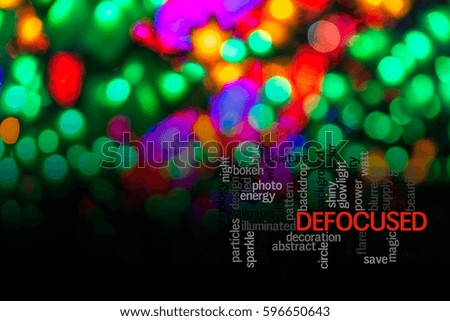 Word  DEFOCUSED with blurred light background.