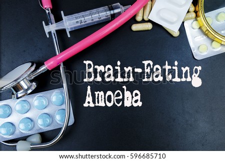 Brain-Eating Amoeba  word, medical term word with medical concepts in blackboard and medical equipment.