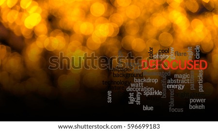 Word  DEFOCUSED with blurred light background.