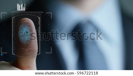 businessman scan fingerprint biometric identity and approval. concept of the future of security and password control through fingerprints in an immersive technology future and cybernetic, business Royalty-Free Stock Photo #596722118