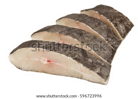 Sliced Halibut fish, white background.