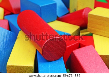 Wooden toy blocks background. Red, Blue, Yellow Green Wooden toy blocks on white background. Wood block texture pattern.