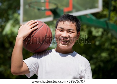 teenager with basketball