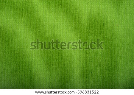 Green fabric texture background. Top view Royalty-Free Stock Photo #596831522
