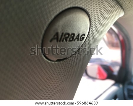 Airbag sign in car , defocus
