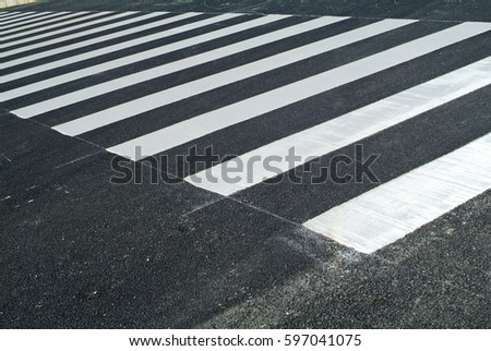 Newly painted Zebra crossing from empty street