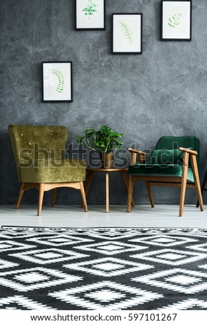 Flat with modern furniture and cyan wall