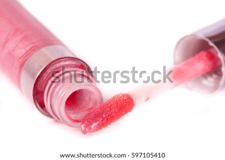 pink lip gloss isolated on white background
