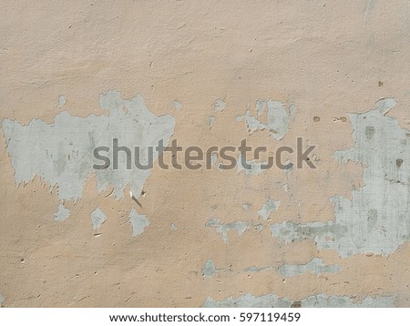 Old cement wall and peeling paint dirty concrete background