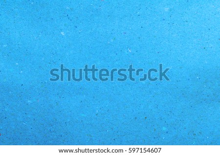 Background of a blue turquoise stucco coated and painted exterior, rough cast of cement and concrete wall texture, decorative coating 