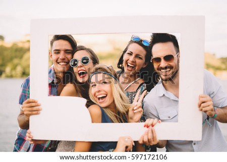 Group of beautiful  happy friends laughing and being cheerful