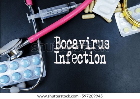 Bocavirus Infection word, medical term word with medical concepts in blackboard and medical equipment.