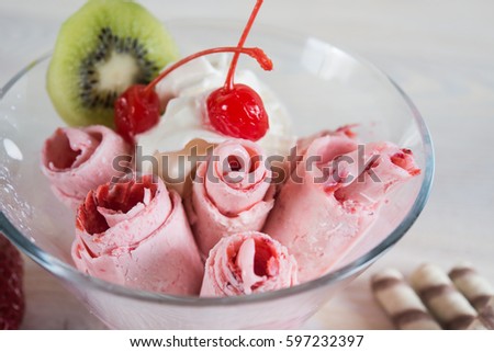 Fresh ice cream roll, ice-roll Royalty-Free Stock Photo #597232397