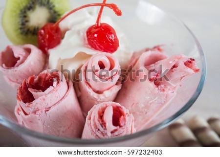 Fresh ice cream roll, ice-roll Royalty-Free Stock Photo #597232403