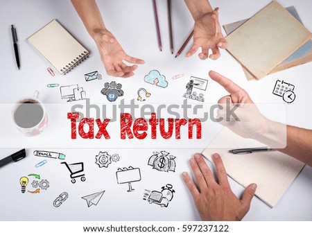 tax return concept. The meeting at the white office table