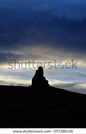 Sandstone formations in Monument Valley, Arizona, at sunset