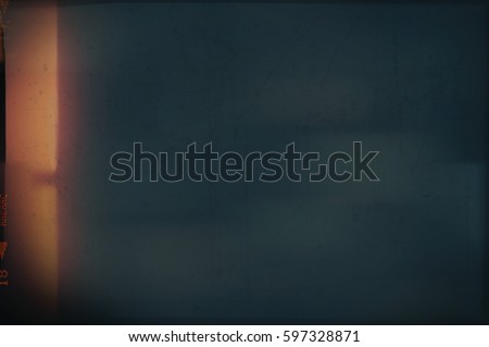 Blank grained and scratched film strip texture background