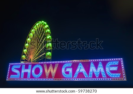 Show Game neon sign at night