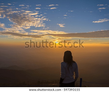 Traveler women see the mountain veiw in the sunrise


