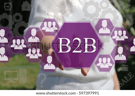 Businesswoman pressing button B2B  on virtual screens in the web network.The concept of The business consultant. 