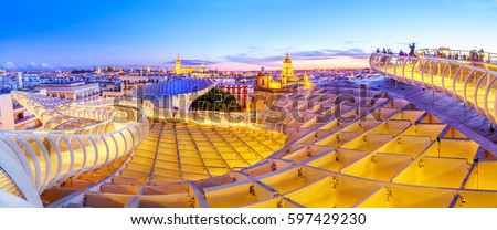 From the top of the Space Metropol Parasol (Setas de Sevilla) one have the best view of the city of Seville, Spain. It provides a unique angle over the old city center and the cathedral. Royalty-Free Stock Photo #597429230