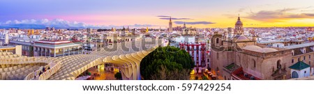 From the top of the Space Metropol Parasol (Setas de Sevilla) one have the best view of the city of Seville, Spain. It provides a unique angle over the old city center and the cathedral. Royalty-Free Stock Photo #597429254