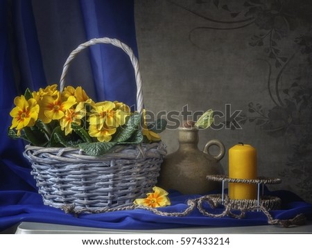 Still life with basket of spring flowers