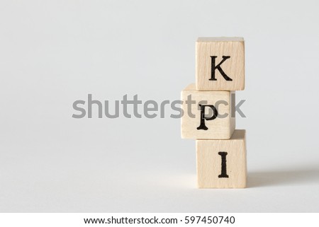 KPI Word Written In Wooden Blocks,Key Performance Indicator Royalty-Free Stock Photo #597450740