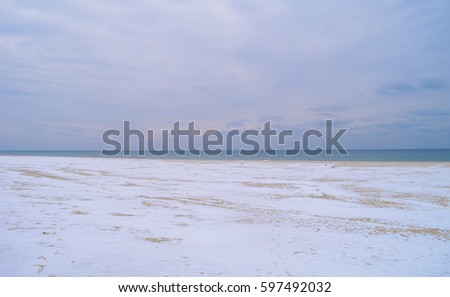 Beautiful views of the winter snow, the beach and the ocean