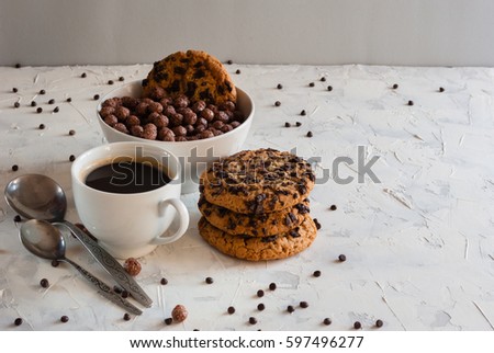 Homemade chocolate chip cookies. Chocolate cereal and coffee. Ch