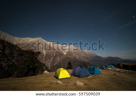 Camping with starry sky in the foothills of the Himalayas. Triund hill, Dharmsala, India.