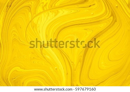 Yellow and gold oil paint abstract background. Oil paint Yellow and gold Oil paint for background. Yellow and gold marble pattern texture abstract background Royalty-Free Stock Photo #597679160